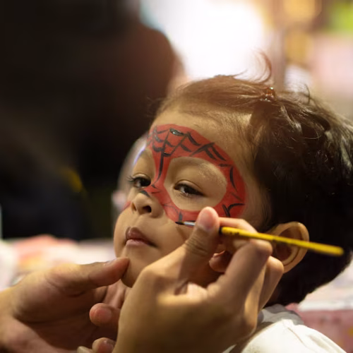 asian-kid-boy-with-painted-face-as-spider_38013-173
